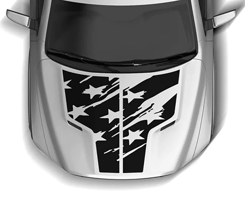 Aggressive distressed American flag hood decal installed on a 2009–2018 Dodge Ram 1500, featuring a bold vertical center graphic with torn stripes and stars on the hood panel.