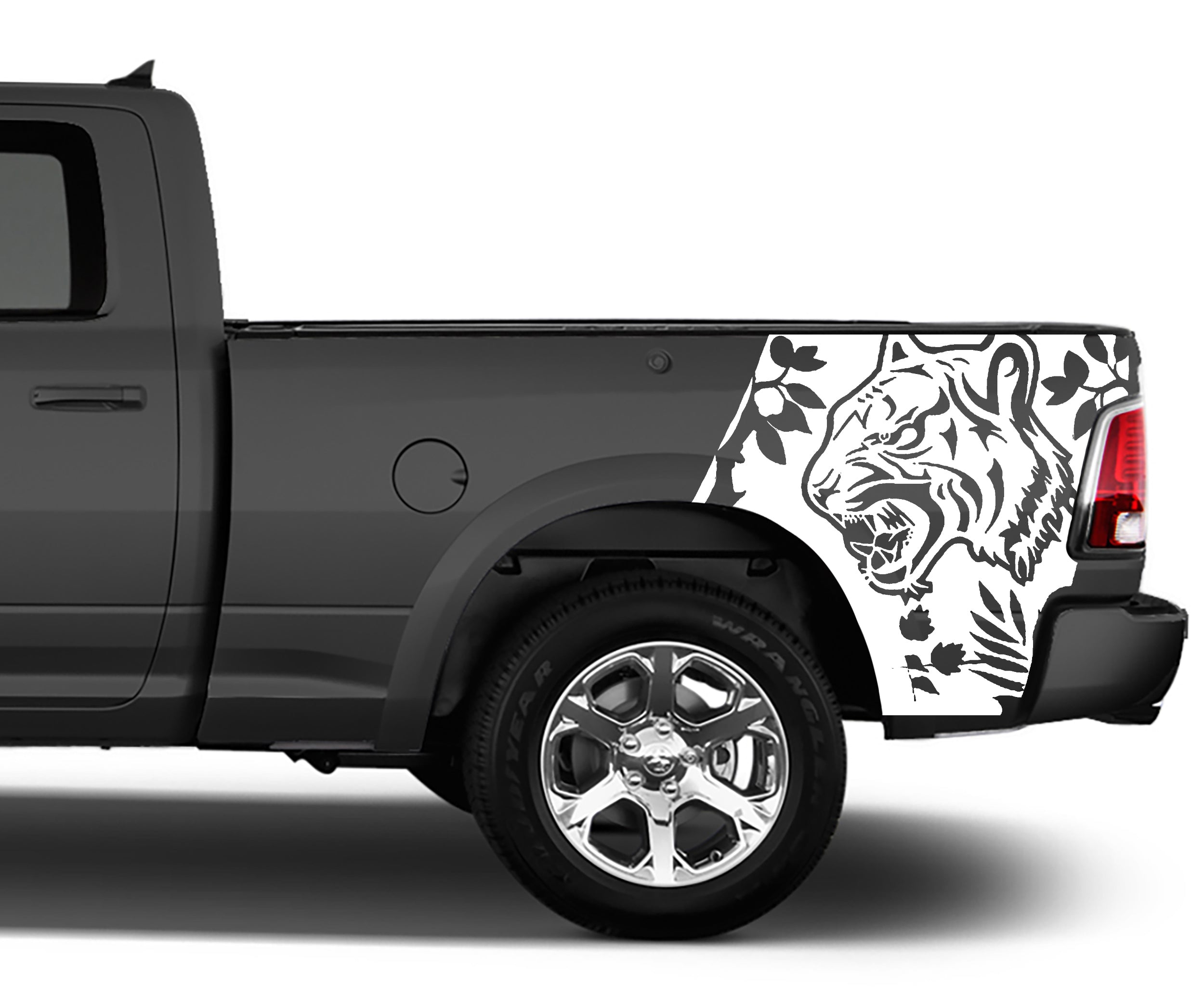 Close-up of tiger bed side vinyl decal details showing tiger face linework and leaf/vine accents for Dodge Ram 1500 bed panel