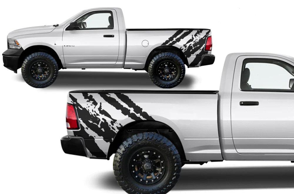 Aggressive splatter-style vinyl bed decal installed on a 2009–2018 Dodge Ram 1500 rear quarter bed panel, featuring claw-like abrasion graphics.