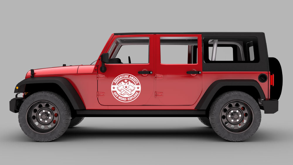 Red Jeep Wrangler JK side view with white “Adventure Awaits” off-road badge door decal