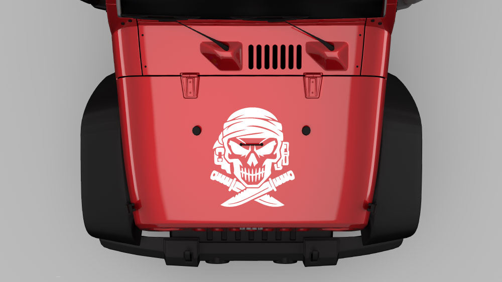 Desert Raider skull hood decal on Jeep Wrangler JK hood, white vinyl graphic on red Jeep