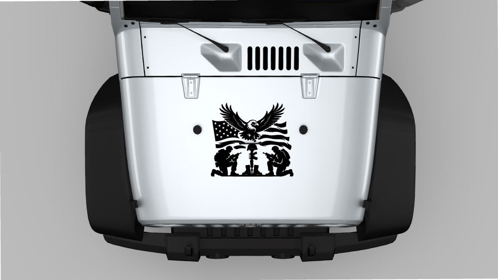 White Jeep Wrangler JK hood with black Eagle of Remembrance decal showing eagle above American flag and kneeling soldiers tribute graphic.