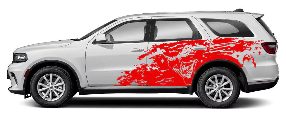 Dodge Durango side view with Joker splash grunge vinyl decal in red, bold horror face graphic across rear side doors.