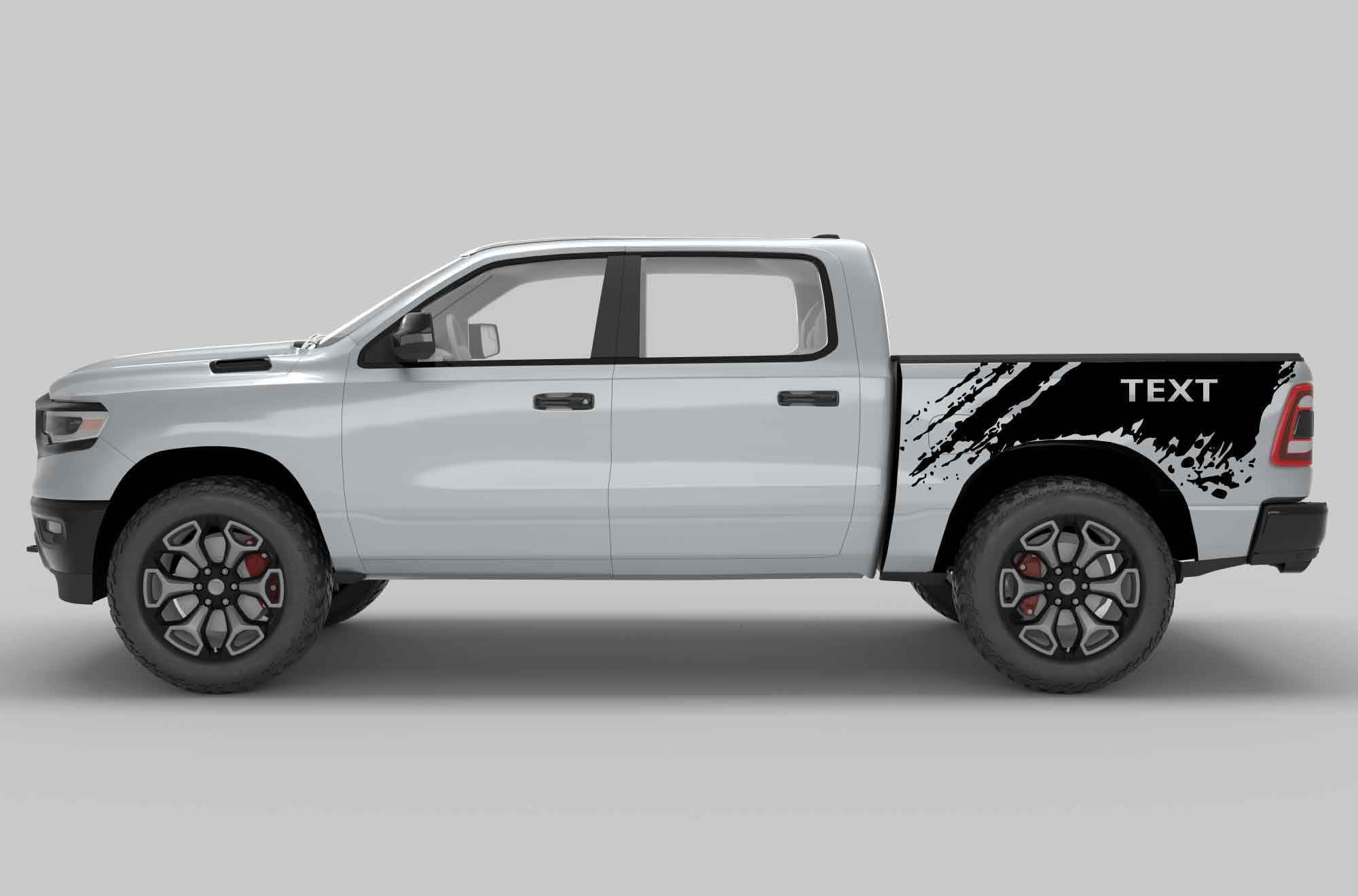 Side view of a silver dodge ram  pickup truck with custom text decals on the side bed in black color