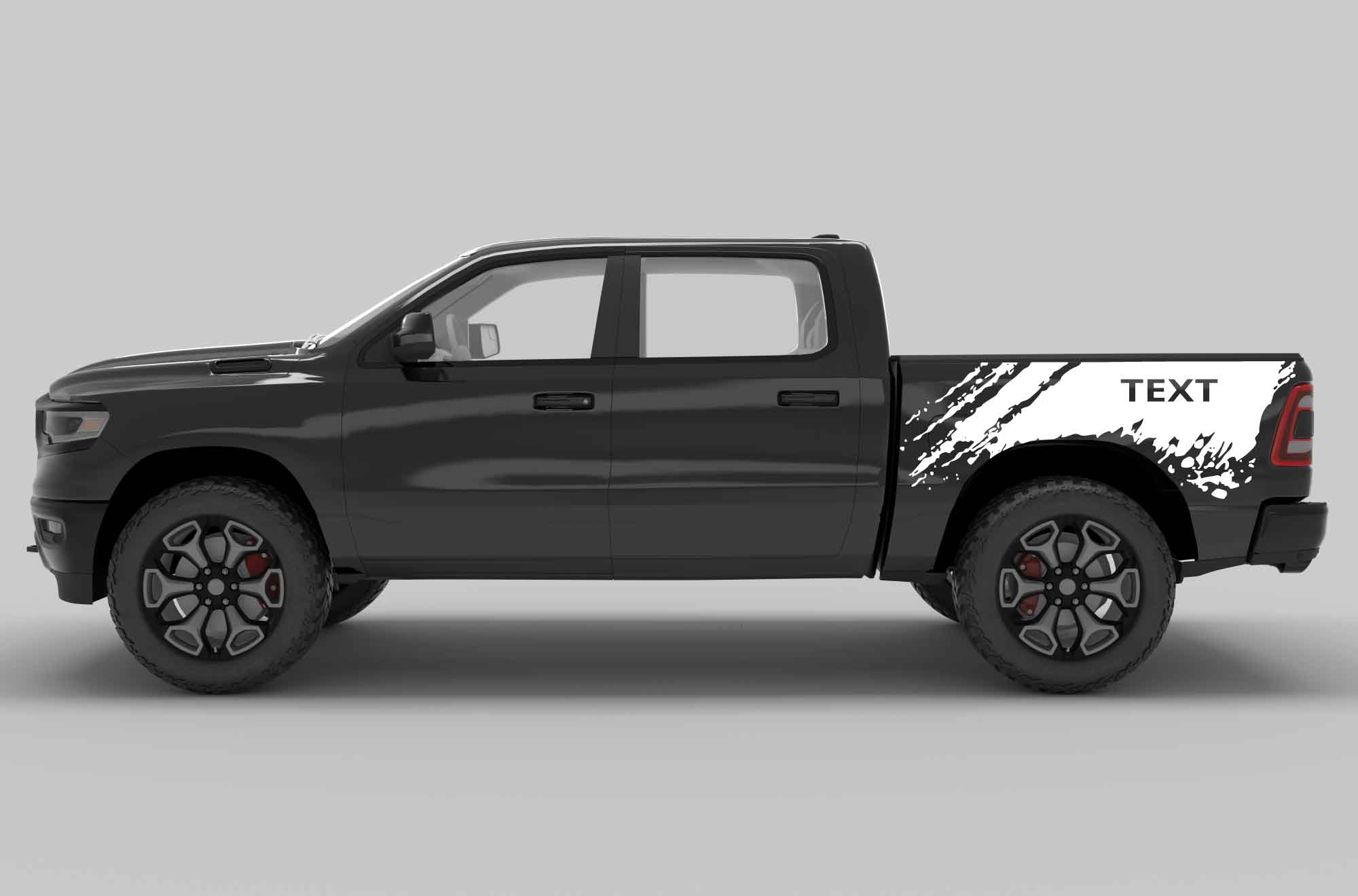 Side view of a black dodge ram  pickup truck with custom text decals on the side bed in white color