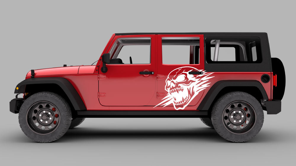 Red Jeep Wrangler JK with white screaming skull side door decal graphic on rear quarter panel