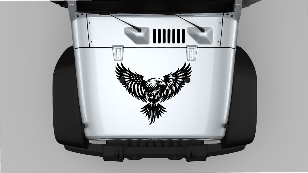 Soaring eagle hood decal in black installed on a white Jeep Wrangler JK, aggressive bird graphic centered on the hood.