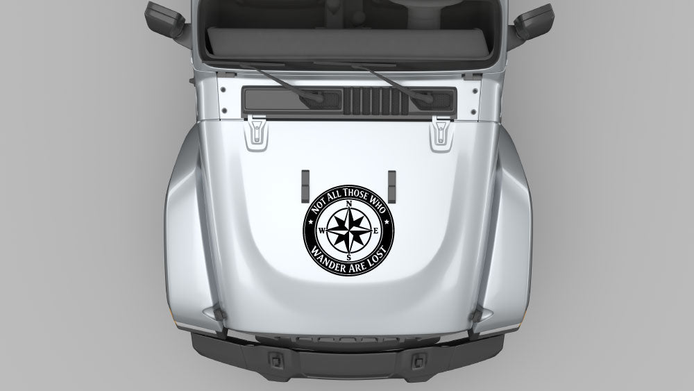 Black wanderers compass circle hood decal on white Jeep Wrangler JL, outdoor adventure compass vinyl design.